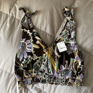 Free people super cute dressy crop top with a floral print with black/ SizeXS